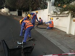 Fibre crew working in a roadside trench